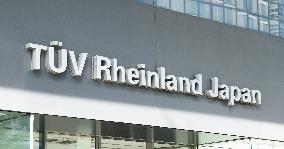 TÜV Rheinland Japan signage and logo